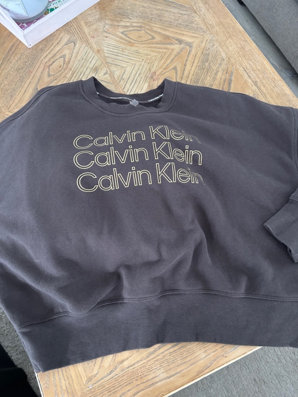 Calvin Klein women’s Brown Crewneck with Gold Logo Print